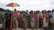 epa03947223 A handout picture provided by the African Union-United Nations Information Support Team (AU-UN IST) shows Internally Displaced People, affected by flooding and clan conflict, waiting for a food handout at an AMISOM military camp near the town of Jowhar, Somalia, 12 November 2013. Heavy rains in Somalia, coupled with recent disputes between clans, have resulted in over four thousand Somalis seeking shelter at an African Union Mission in Somalia (AMISOM) military base near the town of Jowhar, with more arriving daily. EPA/TOBIN JONES / AU-UN IST PHOTO / HANDOUT HANDOUT EDITORIAL USE ONLY/NO SALES epa03947223 A handout picture provided by the African Union-United Nations Information Support Team (AU-UN IST) shows Internally Displaced People, affected by flooding and clan conflict, waiting for a food handout at an AMISOM military camp near the town of Jowhar, Somalia, 12 November 2013. Heavy rains in Somalia, coupled with recent disputes between clans, have resulted in over four thousand Somalis seeking shelter at an African Union Mission in Somalia (AMISOM) military base near the town of Jowhar, with more arriving daily. EPA/TOBIN JONES / AU-UN IST PHOTO / HANDOUT HANDOUT EDITORIAL USE ONLY/NO SALES