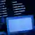 ILLUSTRATION - Ein Mann sitzt am 25.04.2013 in Köln (Nordrhein-Westfalen) vor einem Rechner mit Computer Quellcode auf dem Bildschirm. Weltweit haben Angriffe von Computer Hackern und die Cyber Kriminalität insgesamt zugenommen. Foto: Oliver Berg/dpa