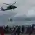 کمک رسانی هلیکوپترهای امریکایی در تاکلوبان
