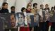Activists holding pictures of the Greenpeace activists at a climate conference in Warsaw in November Activists holding pictures of the Greenpeace activists at a climate conference in Warsaw in November
