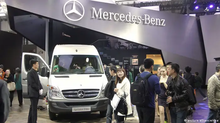 --FILE--People visit the stand of Mercedes-Benz during the 15th Shanghai International Automobile Industry Exhibition in Shanghai, China, 21 April 2013. During the opening of the first engine factory of Mercedes Benz outside of Germany in China, the Chief Xu Heyi of Beijing Automotive (BAIC) said that contracts for a shareholding of Daimler in BAIC would be signed on Tuesday. Daimler would take a sake of 12%.