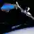 Undatiertes Computerbild zeigt einen Swarm-Forschungssatelliten auf der Erdumlaufbahn. (Foto: Astrium/picture-alliance/dpa)