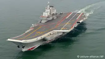 FILE - This May 2012 file photo provided by China's Xinhua News Agency shows the Chinese aircraft carrier Liaoning cruising for a test on the sea. A congressional advisory panel sounded a warning Wednesday about China's military buildup, predicting Beijing could possess the largest fleet of modern submarine and combatant ships in the western Pacific by 2020. The U.S.-China Economic and Security Review Commission said China's military modernization is altering the balance of power in the Asia-Pacific region and challenging decades of U.S. pre-eminence. (AP Photo/Xinhua, Li Tang, File) NO SALES