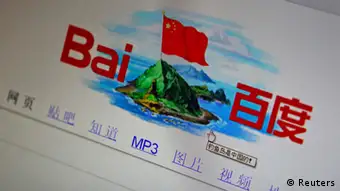 A photo illustration shows a graphic depicting a Chinese national flag flying atop of the disputed islands, called Senkaku by Japan and Diaoyu by China, being seen on the front page of Chinese search engine website Baidu, on a computer screen in Beijing, in this September 18, 2012 file photo. The Chinese characters below the graphic read, Diaoyu Islands belong to China! Picture taken September 18, 2012. To match Special Report CHINA-NAVY/ REUTERS/Stringer/Files (CHINA - Tags: POLITICS SCIENCE TECHNOLOGY BUSINESS)