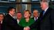 German Chancellor Angela Merkel (C), head of the Christian Democratic Union (CDU) smiles as leaders Horst Seehofer (R) of the Christian Social Union (CSU) and Sigmar Gabriel of the Social Democratic Party (SPD) shake hands after signing a preliminary agreement, which has still to be approved by the members of the SPD, in the Bundestag in Berlin, November 27, 2013. Chancellor Angela Merkel's conservatives and the centre-left Social Democrats (SPD) clinched a coalition deal early on Wednesday that puts Germany on track to have a new government in place by Christmas. The agreement was struck roughly two months after Merkel was the clear winner in national elections but fell short of a parliamentary majority, forcing her into talks with the arch-rival SPD, with whom she ruled in an awkward "grand coalition" during her first term as Chancellor from 2005-2009. REUTERS/Tobias Schwarz (GERMANY - Tags: POLITICS) German Chancellor Angela Merkel (C), head of the Christian Democratic Union (CDU) smiles as leaders Horst Seehofer (R) of the Christian Social Union (CSU) and Sigmar Gabriel of the Social Democratic Party (SPD) shake hands after signing a preliminary agreement, which has still to be approved by the members of the SPD, in the Bundestag in Berlin, November 27, 2013. Chancellor Angela Merkel's conservatives and the centre-left Social Democrats (SPD) clinched a coalition deal early on Wednesday that puts Germany on track to have a new government in place by Christmas. The agreement was struck roughly two months after Merkel was the clear winner in national elections but fell short of a parliamentary majority, forcing her into talks with the arch-rival SPD, with whom she ruled in an awkward "grand coalition" during her first term as Chancellor from 2005-2009. REUTERS/Tobias Schwarz (GERMANY - Tags: POLITICS)