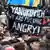 Участники демонстрации с плакатом Yanukovich, we are fucking angry