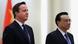 BEIJING, CHINA - DECEMBER 02: Chinese Premier Li Keqiang (R) and British Prime Minister David Cameron (L) listen to their national anthems during a welcoming ceremony inside the Great Hall of the People on December 2, 2013 in Beijing, China. At the invitation of Chinese Premier Li Keqiang, British Prime Minister David Cameron will pay an official visit to China from December 2 to 4. (Photo by Feng Li/Getty Images) BEIJING, CHINA - DECEMBER 02: Chinese Premier Li Keqiang (R) and British Prime Minister David Cameron (L) listen to their national anthems during a welcoming ceremony inside the Great Hall of the People on December 2, 2013 in Beijing, China. At the invitation of Chinese Premier Li Keqiang, British Prime Minister David Cameron will pay an official visit to China from December 2 to 4. (Photo by Feng Li/Getty Images)
