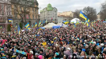 ITAR-TASS: LVOV, UKRAINE. DECEMBER 2, 2013. Demonstrators stage a protest against the Government's decision to suspend Ukraine's European integration in Lviv. (Photo ITAR-TASS/ Vitaliy Hrabar)
