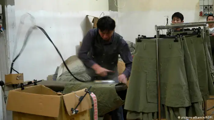 Italien - Textilfabrik Prato, Chinesische Arbeiter