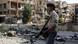 16-Jähriger mit Gewehr in Aleppo (Foto: AFP/ Getty Images) 16-Jähriger mit Gewehr in Aleppo (Foto: AFP/ Getty Images)