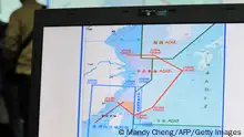 A map of Air Defence Identification Zone (ADIZ) in the East China Sea is displayed during a press conference in Taipei on December 2, 2013. Taiwan said its military planes have made about 30 flights into a part of China's newly declared air defence zone which overlaps a similar Taiwanese zone. AFP PHOTO / Mandy CHENG (Photo credit should read Mandy Cheng/AFP/Getty Images)