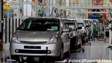 Toyota to cut production as chip shortage bites