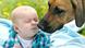 Baby mit Hund (Foto: Fotolia/pitrs). Baby mit Hund (Foto: Fotolia/pitrs).