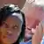 Ein weißer Mann weint um Nelson Mandela, davor eine schwarze Frau