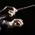 Conductor's Hands and baton, Copyright: Alenavlad