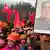 A man holds up a portrait of the late Chairman Mao Zedong as he and others gather in front of a giant statue of Mao on a square to celebrate the 120th birth anniversary of the former leader, in Shaoshan, Mao's hometown, December 26, 2013. Thursday marks the 120th anniversary of Mao's birth, with various commemorative activities scheduled to be carried out throughout the nation. Photo: REUTERS