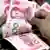 Pair of hands counting Chinese banknotes