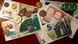 Euro and lat coins and bills on a table in Latvia. Euro and lat coins and bills on a table in Latvia.