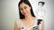 The Lebanese graphic designer Maya Zankoul poses with a book and pen in her hand The Lebanese graphic designer Maya Zankoul poses with a book and pen in her hand
