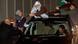 A released Palestinian prisoner in a car is greeted by family and friends A released Palestinian prisoner in a car is greeted by family and friends