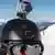 A GoPro camera mounted on a ski helmet
