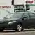 A Toyota Camry leaves ashowroom in the US