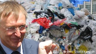 Commissioner Potocnik in front of plastic waste
