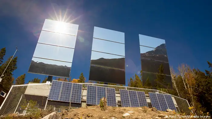 Mirrors reflect sunlight in Norway.