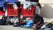 A homeless woman in Los Angeles sits among her belongings in three large shopping carts. A homeless woman in Los Angeles sits among her belongings in three large shopping carts.
