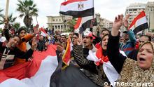 Egyptian supporters of the military-installed government wave national flags and shout slogans as the take part in a rally for the anniversary of the 2011 Arab Spring uprising on January 25, 2014 in the northern port city of Alexandria. A spate of deadly bombings put Egyptian police on edge as supporters and opponents of the military-installed government take part in rival rallies for the anniversary of the 2011 Arab Spring uprising. AFP PHOTO / STR (Photo credit should read -/AFP/Getty Images)