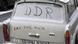 The Trabi car from East Germany with snow on its back windshield with the words DDR inscribed on it The Trabi car from East Germany with snow on its back windshield with the words DDR inscribed on it