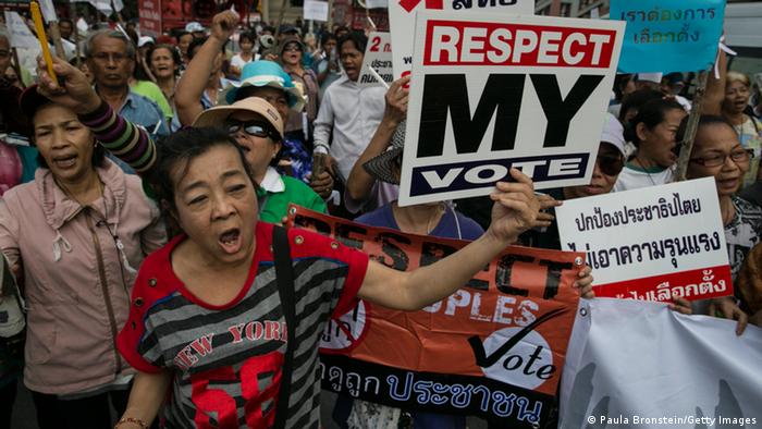 Protesters with posters
(Photo: Paula Bronstein/Getty Images)