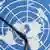Mikrofon vor UN-Logo (Foto: picture-alliance/dpa)