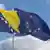 Bosnia's flag pictured next to an EU flag