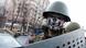 Участник протестов на Майдане в маске и в каске Участник протестов на Майдане в маске и в каске