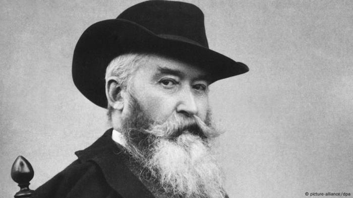 Porträtfoto von Wilhelm Busch mit Hut.