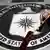 Angestellter reinigt das Logo des US-Geheimdienstes CIA in Langley (foto: dpa/PA)