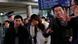 Relatives waiting at Beijing airport. REUTERS/Kim Kyung-Hoon ( Relatives waiting at Beijing airport. REUTERS/Kim Kyung-Hoon (