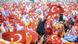 People hold Turkish flags (photo: BULENT KILIC/AFP/Getty Images) People hold Turkish flags (photo: BULENT KILIC/AFP/Getty Images)