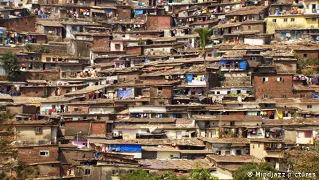 Shanty huts stretch back into the distance in this huge slum - a scene from the film Population Boom Photo: Mindjazz pictures