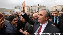 TO GO WITH AFP STORY BY BURAK AKINCI In this photo taken on March 3, 2014 Turkey's main opposition Republican People's Party (CHP) mayoral candidate Mansur Yavas (2nd R) waves to supporters during a campaign rally in Ankara. AFP PHOTO / ADEM ALTAN (Photo credit should read ADEM ALTAN/AFP/Getty Images)