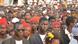 A crowd of voters at a campaign rally A crowd of voters at a campaign rally