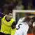 Dortmund's Henrich Mchitarjan and Madrid's Fabio Coentrao fight over the ball