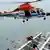 A maritime police helicopter rescues passengers who were onboard South Korean ferry "Sewol" which capsized off Jindo April 16, 2014 in this picture provided by West Regional Headquarters Korea Coast Guard and released by News1. Almost 300 people were missing after a ferry capsized off South Korea on Wednesday, despite frantic rescue efforts involving coastguard vessels, fishing boats and helicopters, in what could be the country's biggest maritime disaster in over 20 years. REUTERS/West Regional Headquarters Korea Coast Guard/News1