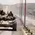 Syrian tanks in Maaloula (AP Photo/SANA)