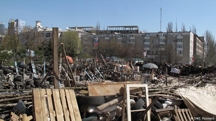 Barricades made of tires, razor wire and pallets in Donetsk, Ukraine