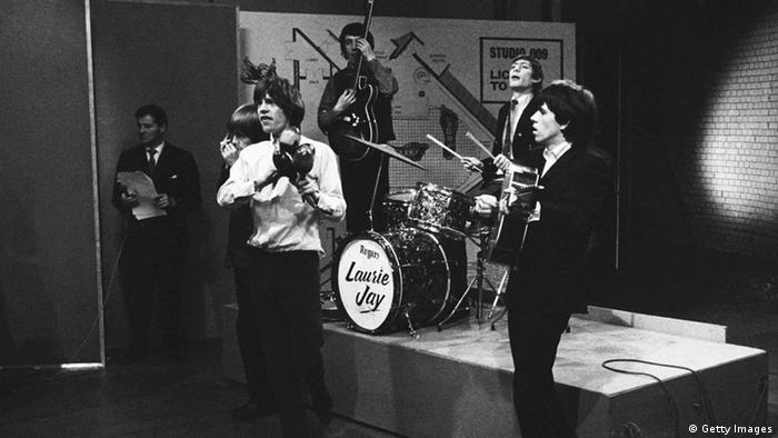 Black and white picture of a four man band