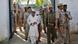 A Muslim man, who was displaced by deadly religious strife last year, arrives to cast his vote for the general election at a polling station escorted by police in Palra village, in Muzaffarnagar district in the northern Indian state of Uttar Pradesh April 10, 2014. The election is spread out over five weeks, with voting ending on May 12. It was the turn of voters in Delhi, the capital, on Thursday and many parts of Uttar Pradesh, including Muzaffarnagar, where Narendra Modi's popularity is running high and Muslims are worried about their future. For many of the 815 million registered to vote, Modi and his Bharatiya Janata Party (BJP) represent a promise of better governance, industrial growth and job creation. REUTERS/Anindito Mukherjee A Muslim man, who was displaced by deadly religious strife last year, arrives to cast his vote for the general election at a polling station escorted by police in Palra village, in Muzaffarnagar district in the northern Indian state of Uttar Pradesh April 10, 2014. The election is spread out over five weeks, with voting ending on May 12. It was the turn of voters in Delhi, the capital, on Thursday and many parts of Uttar Pradesh, including Muzaffarnagar, where Narendra Modi's popularity is running high and Muslims are worried about their future. For many of the 815 million registered to vote, Modi and his Bharatiya Janata Party (BJP) represent a promise of better governance, industrial growth and job creation. REUTERS/Anindito Mukherjee
