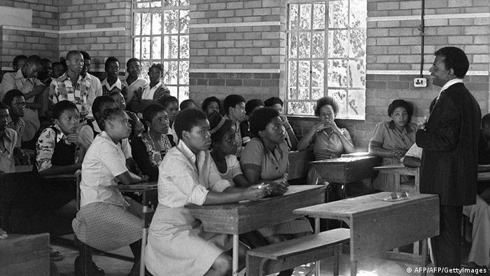 Students listen to a teacher in a school in South Afirca in this archive photo from 1977