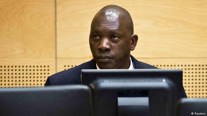 Thomas Lubanga listens to court in his hearing in the Hague